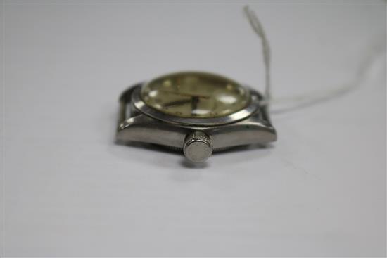 A boys size steel Rolex Oyster wrist watch, numbered 143209 2280, a 9ct gold Rotary watch and a ladys 18ct Movado watch.